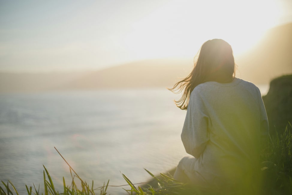 Woman sat thinking in solitude